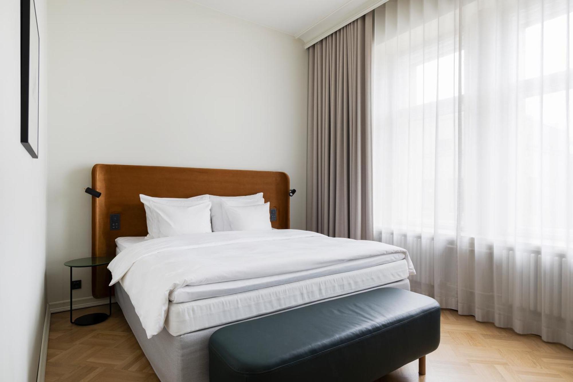 赫尔辛基托尔尼索罗索酷酒店 外观 照片 A bedroom at the Hotel